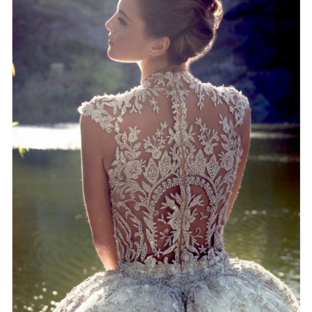 Elegant Ysa Makino White Lace beaded wedding Gown with detachable ballgown